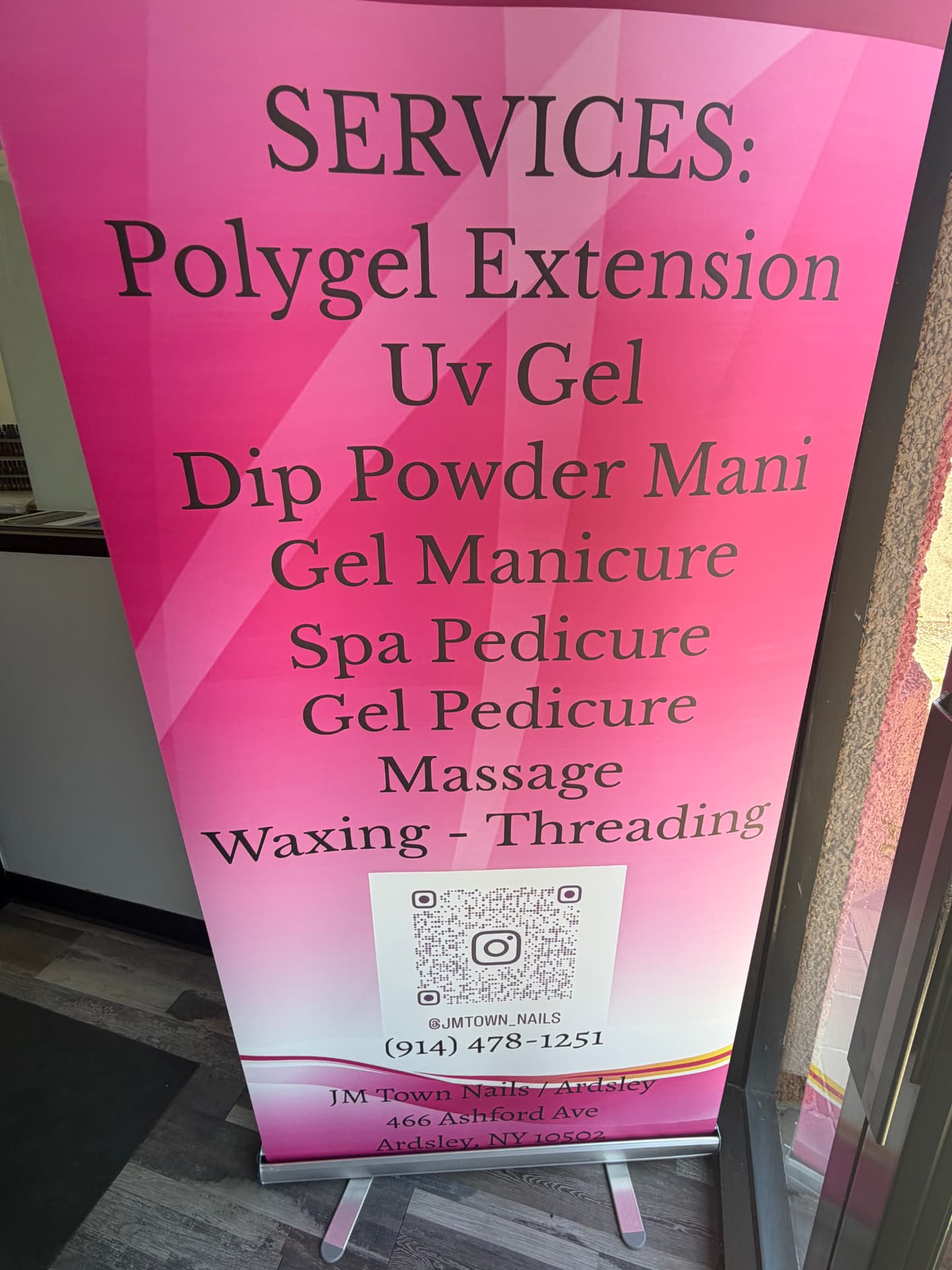 Services banner inside JM Town Nails listing polygel extension, UV gel, dip powder mani, gel manicure, spa pedicure, gel pedicure, massage, waxing and threading